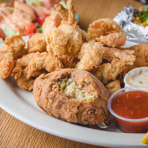 Barbecue Inn's fried shrimp and stuffed crab with cocktail sauce and tartar sauce.