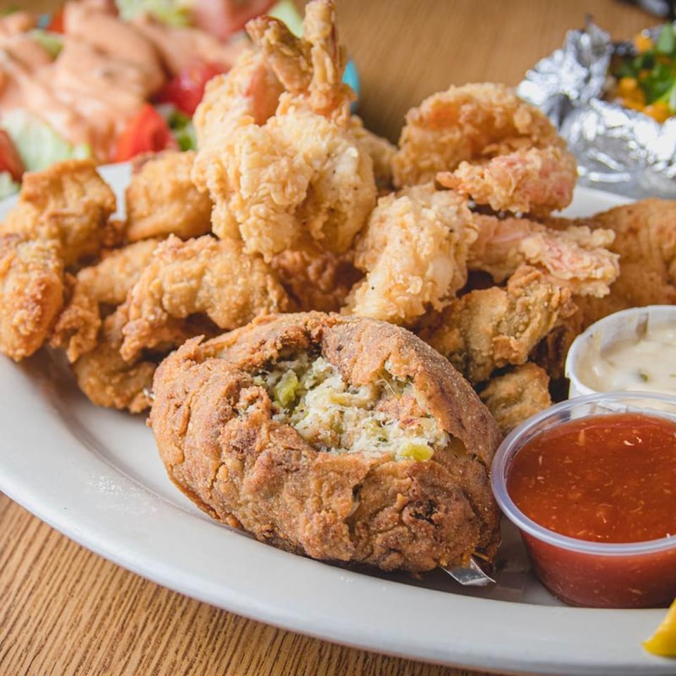 Barbecue Inn's fried shrimp and stuffed crab with cocktail sauce and tartar sauce.